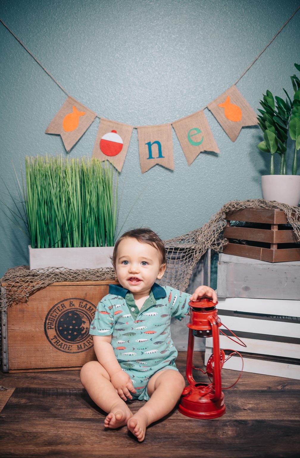 First birthday session with a ONE banner