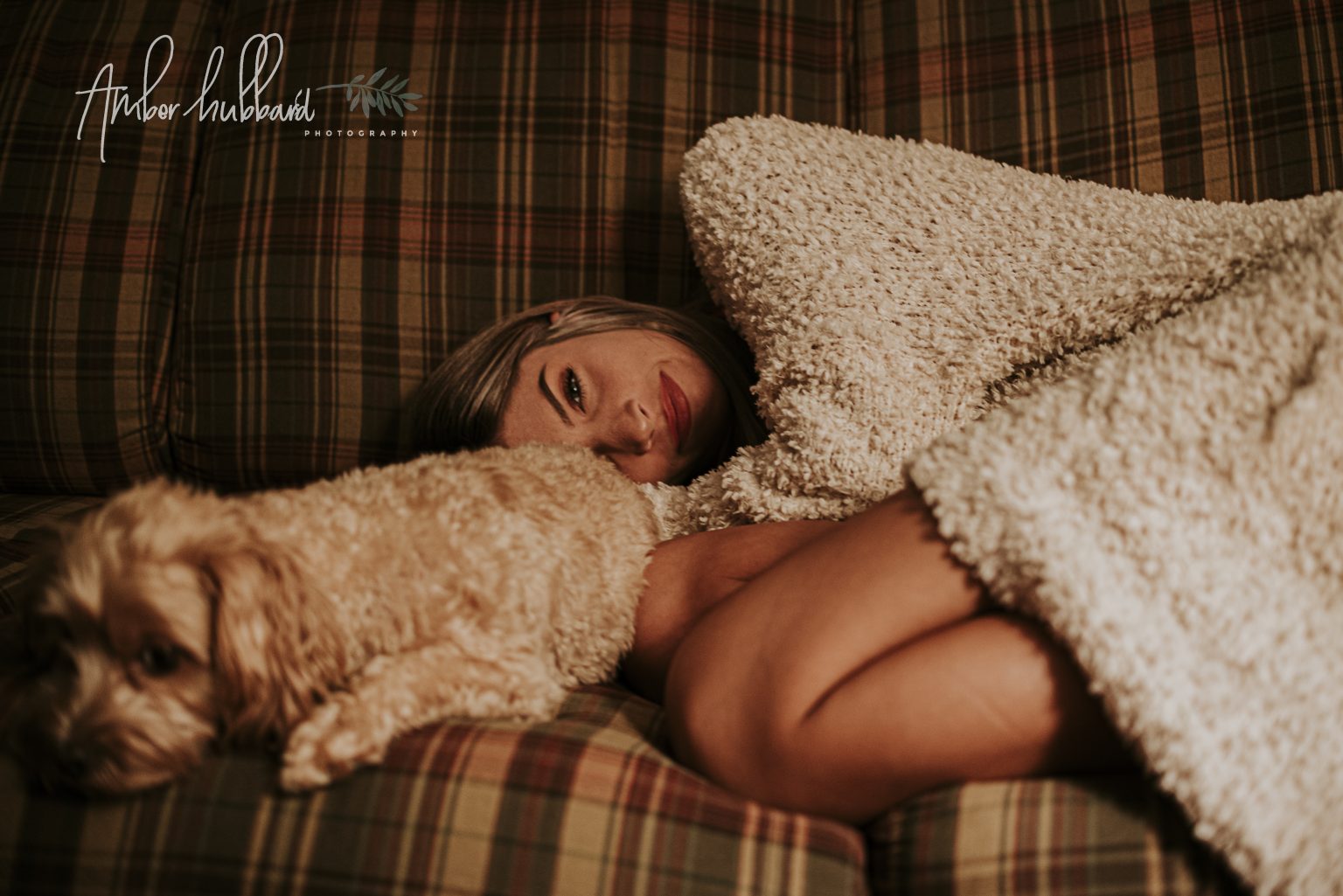 Little one asleep with a teddy bear at home