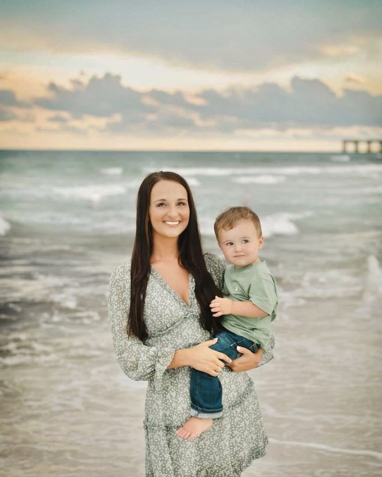 Mother and son together at the shoreline