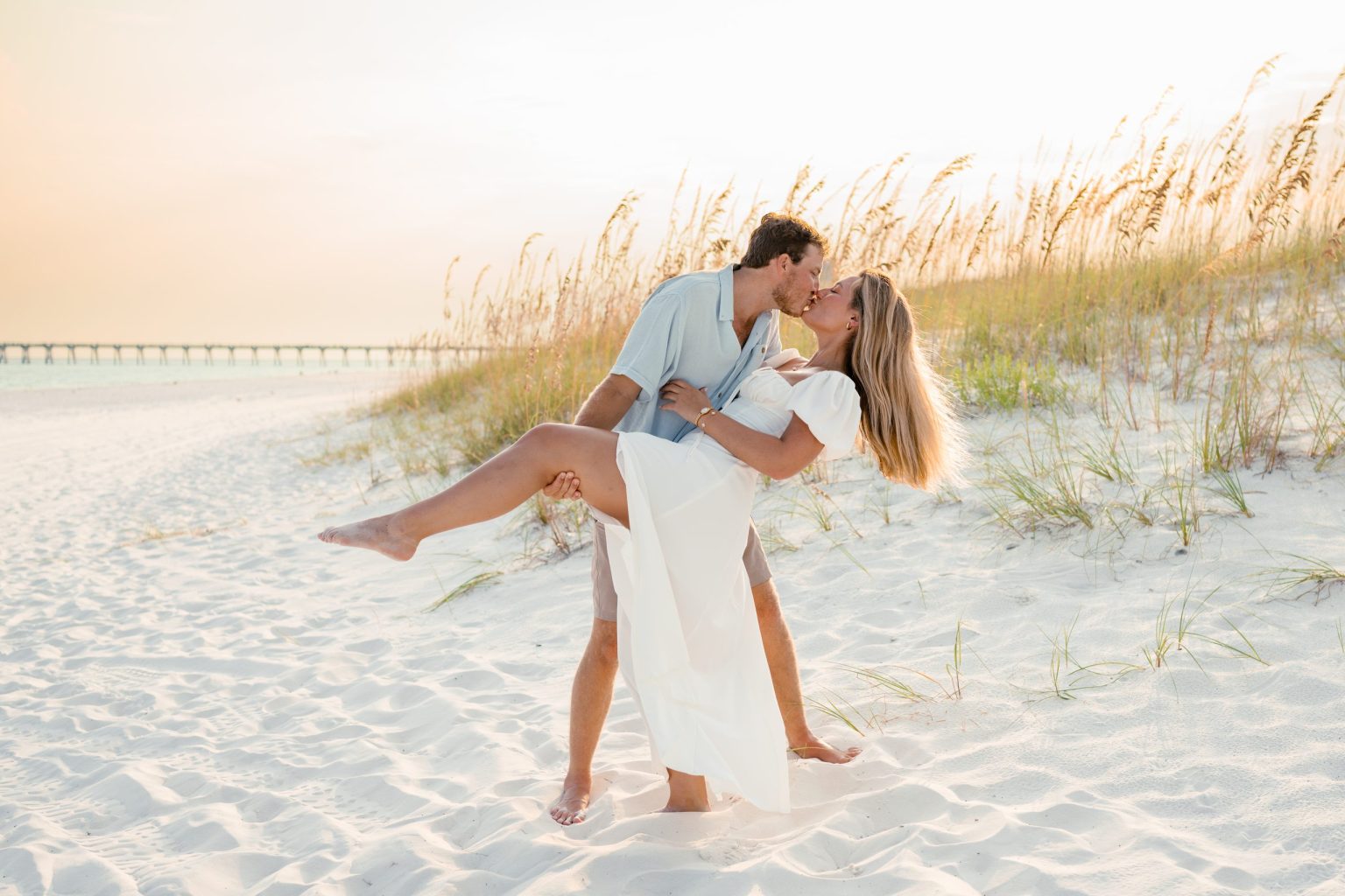 Couple at golden hour on Navarre Beach