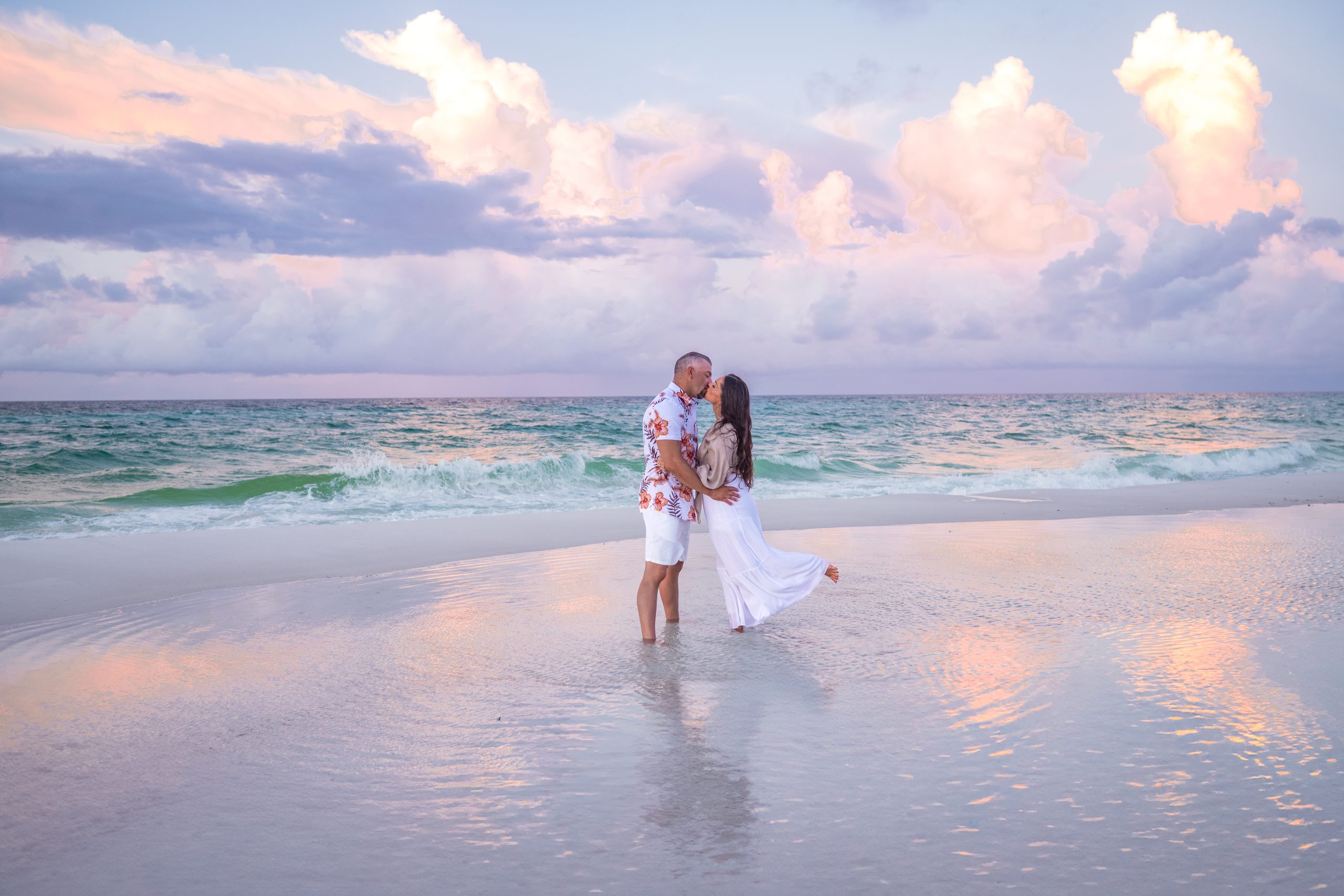 Navarre Beach couples and engagement photographer &mdash; a couple at golden hour on the sand