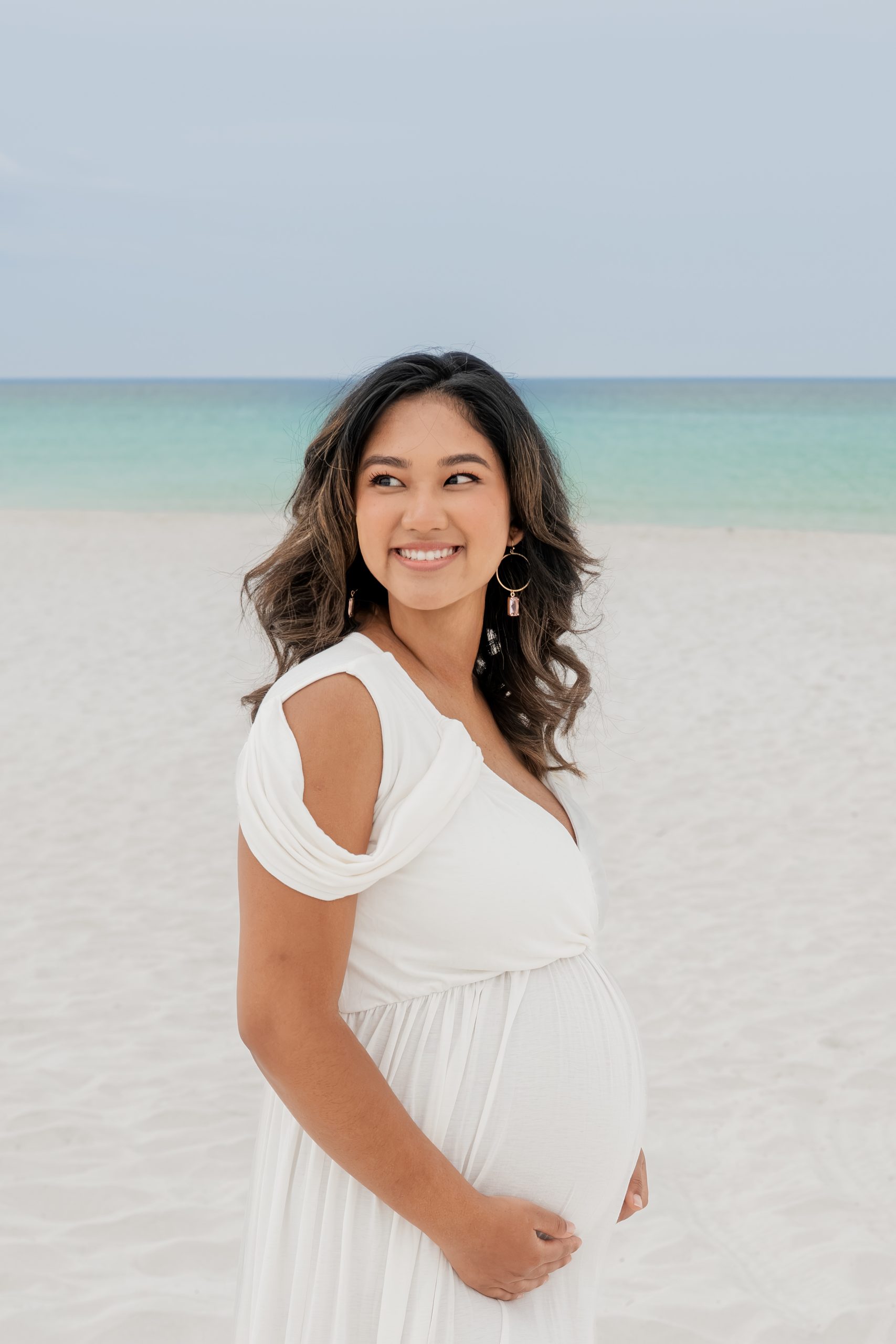 Navarre Beach maternity portrait at golden hour
